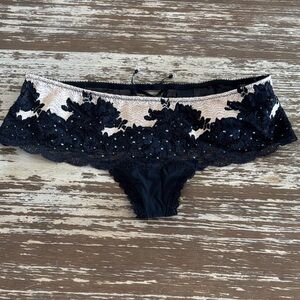Victoria's Secret Black Sheer pantie with beautiful details perfect condition